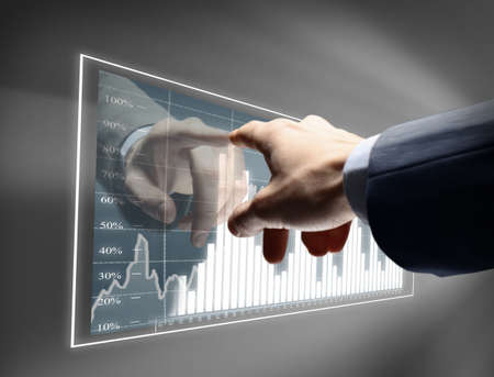 Working man drawing color graphics devoted to business Working man drawing color graphics devoted to business