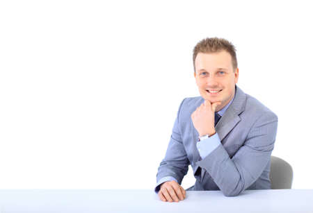 young business man on a desk, isolated on white の写真素材