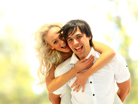 Happy smiling couple in love. Over white background
