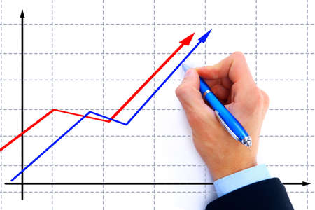 businessman drawing an organization chart on a white board