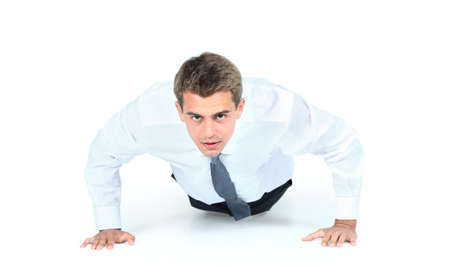 Business man doing push-upsの写真素材