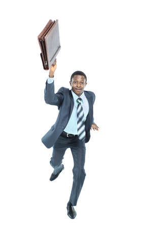Businessman running with a briefcase, isolated on white backgroundの写真素材
