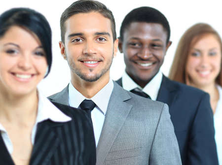 Happy smiling business team standing in a rowの写真素材