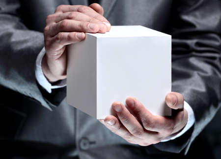 Cube in the male handsの写真素材