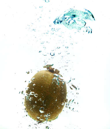 fresh water drops on kiwi isolated on whiteの写真素材