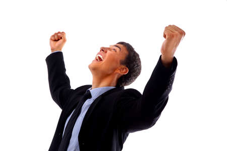 One very happy energetic businessman with his arms raisedの写真素材
