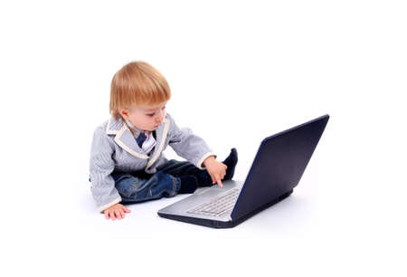 Little child and laptop Isolated on white background
の写真素材