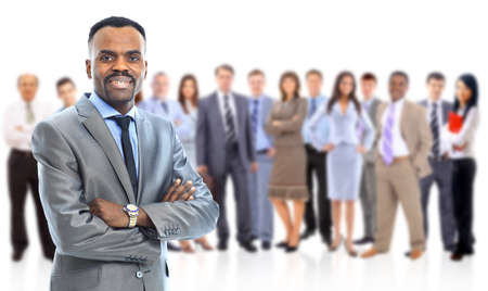 Leader and her team, Young attractive business people with focus only on businesswoman in the middle