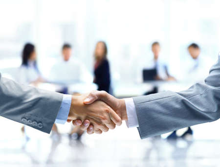 Close up of businessmen shaking hands