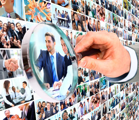 Human resource concept, magnifying glass searching peopleの写真素材