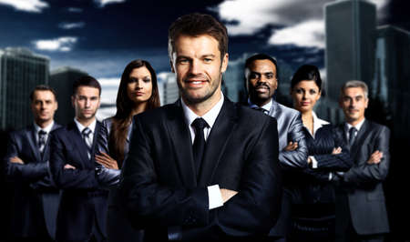 business team standing over a dark background
