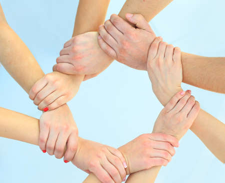 Ring of hands teamwork showing your product