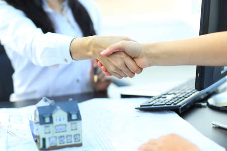 agent shows a build project to a clientの写真素材