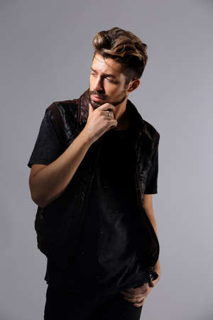 Studio shot of a fashionable manの写真素材