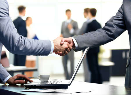 Business handshake and business peopleの写真素材
