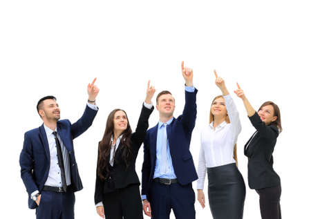 business people in a row pointing and looking up to copy space isolated on white backgroundの写真素材