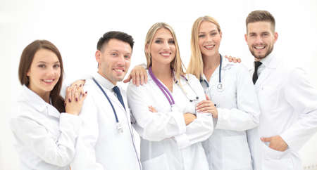 Portrait of group of smiling hospital colleagues standing together