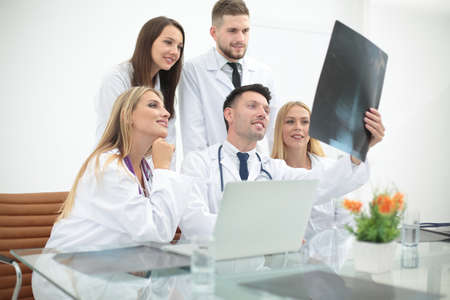 Portrait of confident happy group of doctors working at the medical officeの写真素材