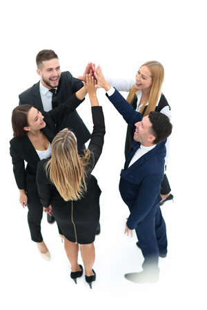 Business team showing unity with their hands togetherの写真素材