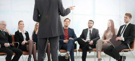 Employees carefully listening to your boss at a business meeting at your Desk in the office