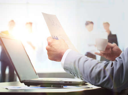 Businessman working in the office. early in the morningの写真素材