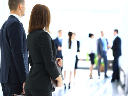 Successful business people looking happy and confident