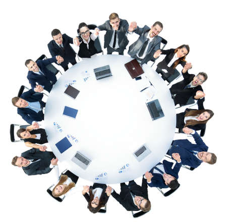 Happy business team pointing at somethingの写真素材