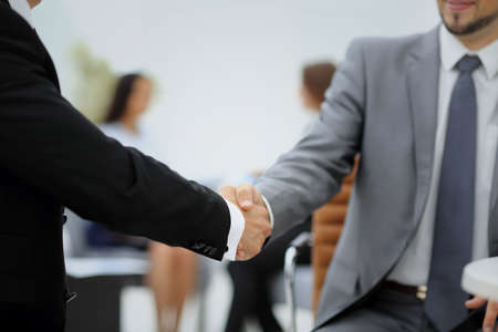 Business people shaking hands during a meeting
