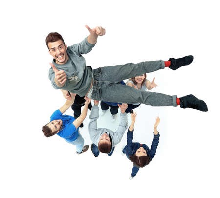 group of young people congratulating each otherの写真素材