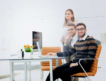 Closeup photo young business managers working with new startup project in office