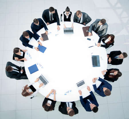 Round table discussion at Business convention and Presentation. Audience at the conference hall.の写真素材