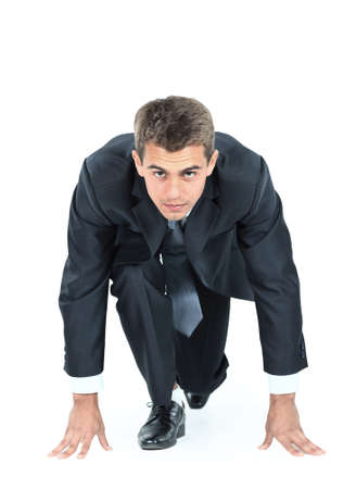 start your business - business man ready to start running over whiteの写真素材