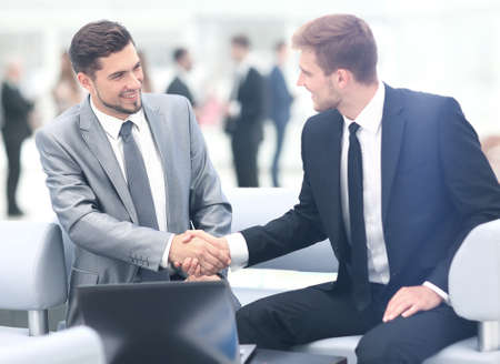 Business people shaking hands during a meeting