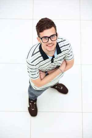 Everyday winner. Top view of happy young man expressing positivityの写真素材