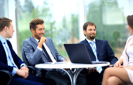 manager discussing work with his colleagues