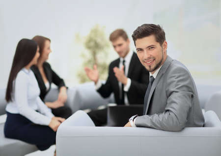 Group of business partners discussing ideas with their leader onの写真素材