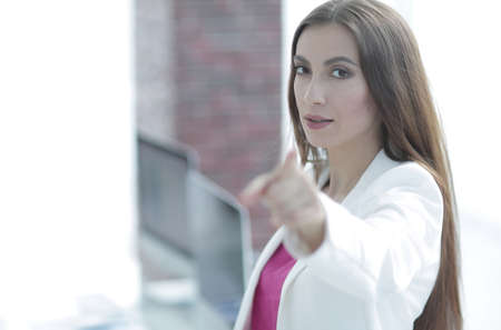 confident business woman pointing finger forwardの写真素材