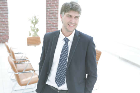 businessman on a background of an empty conference room