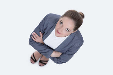 business concept. view from the top. business woman looking up.の写真素材