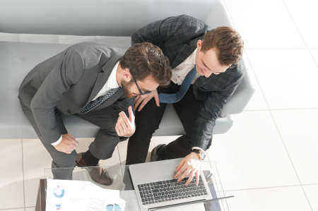 employees working with a laptopの写真素材