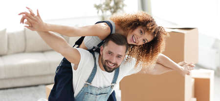 Happy married couple in a new house.の写真素材