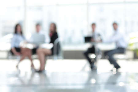 Business team meeting in office.  Blurred image.の写真素材