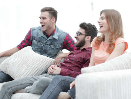 group of young people going on the couch.