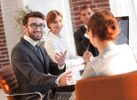 business team discussing new ideas at your Desk.