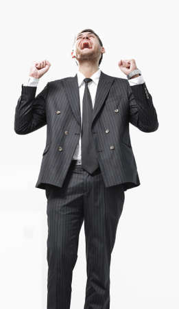 portrait, triumphant businessman ,isolated on white backgroundの写真素材