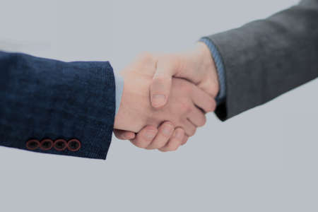businessman shaking hands to seal a deal with his partnerの写真素材