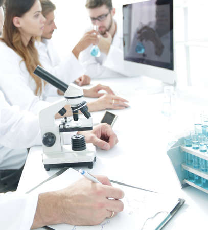 serious scientists working in the laboratoryの写真素材