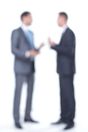 blurry photo. two businessmen with documentsの写真素材