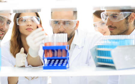 closeup of a group of scientists and pharmacists in the laboratory.の写真素材