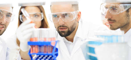 closeup of a group of scientists and pharmacists in the laboratory.の写真素材